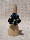 Deep teal iris flower