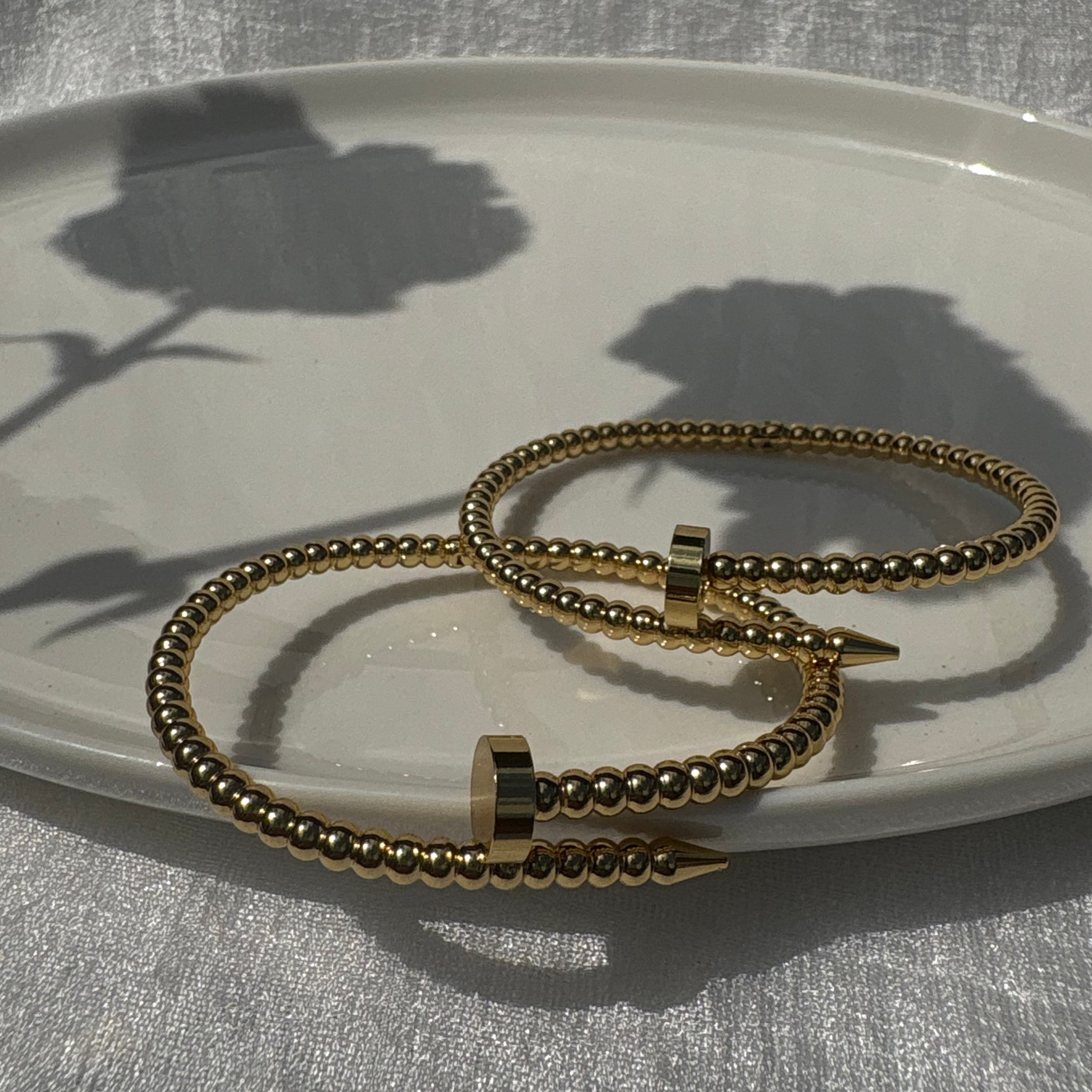 Beaded nail bracelet