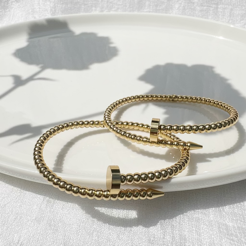 Beaded nail bracelet