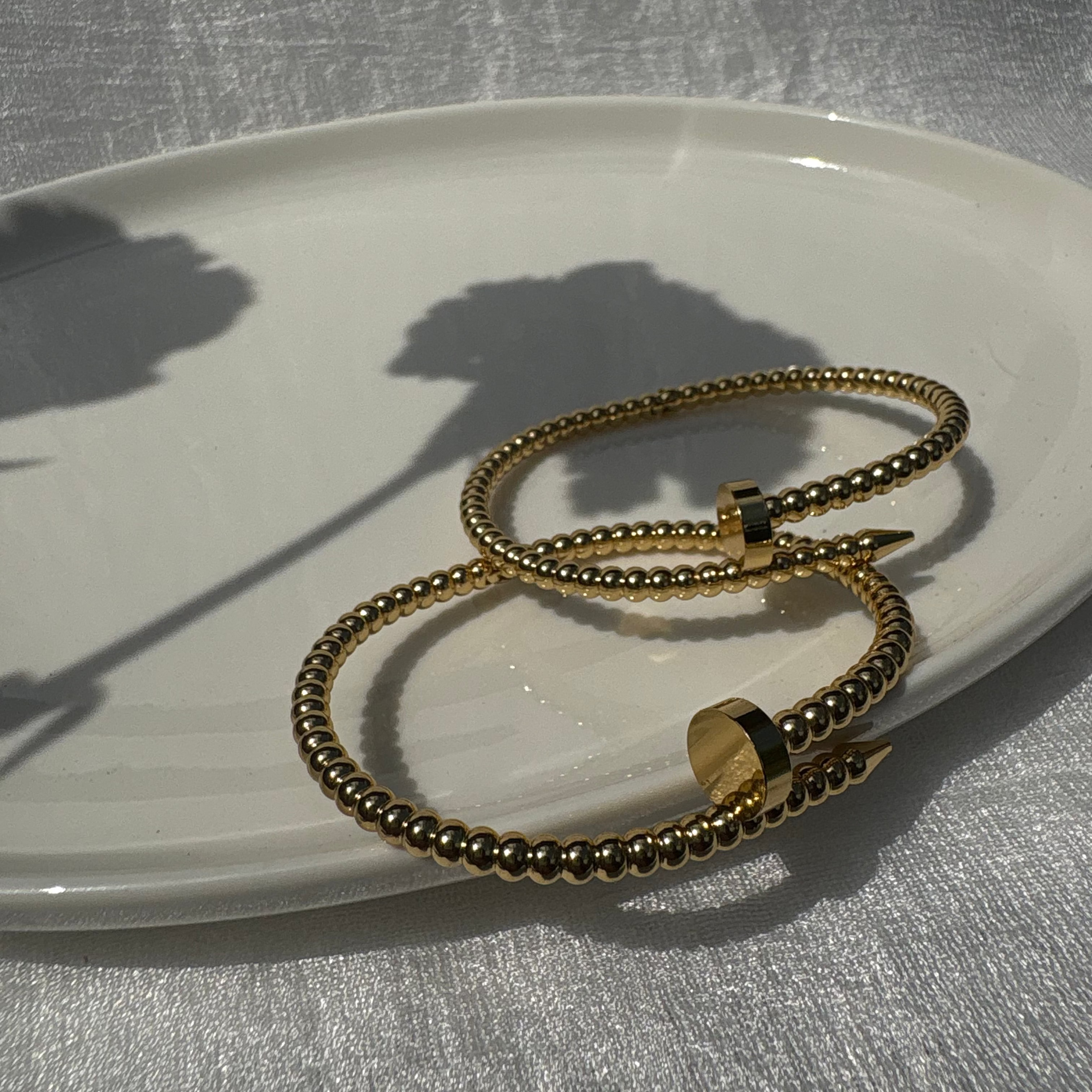 Beaded nail bracelet