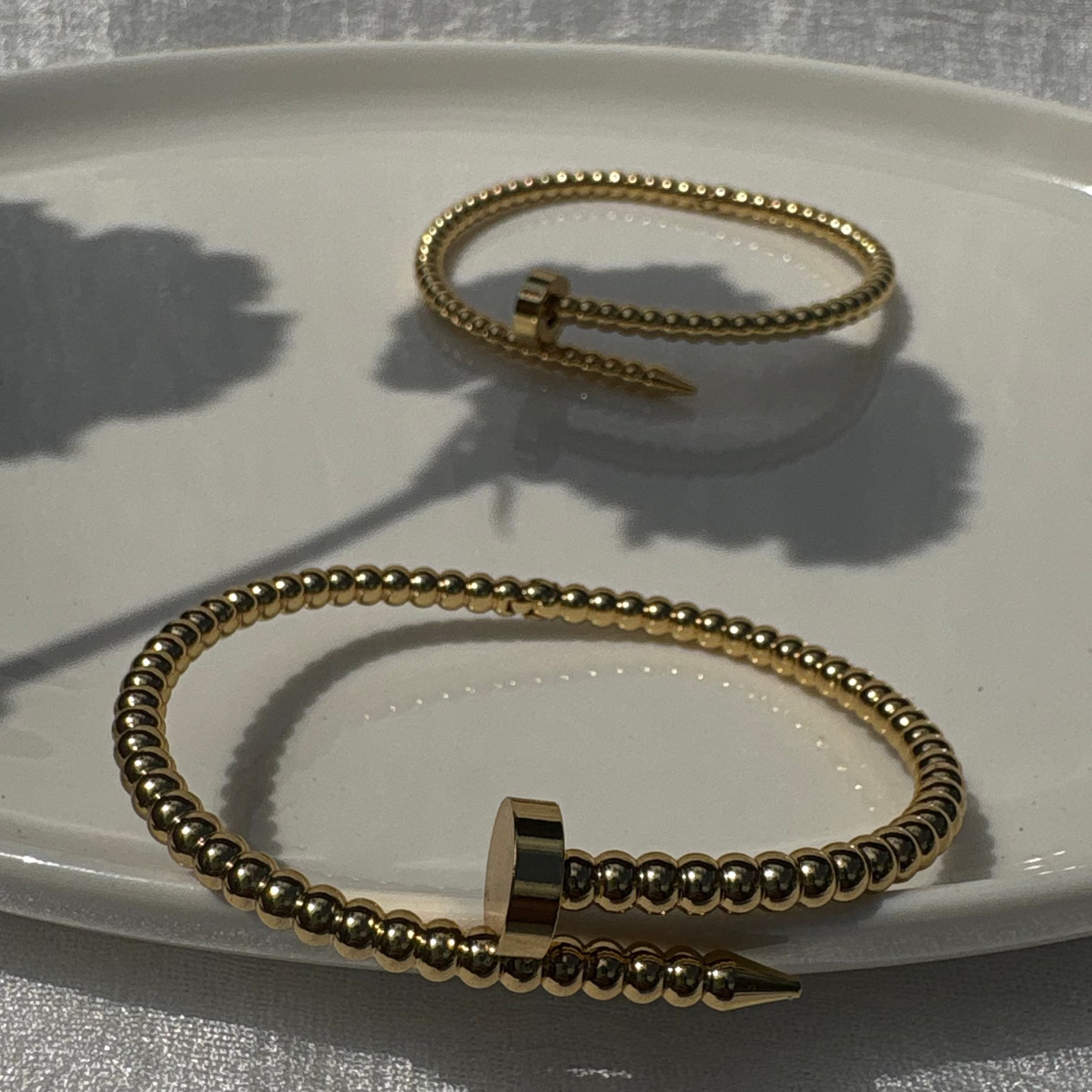 Beaded nail bracelet